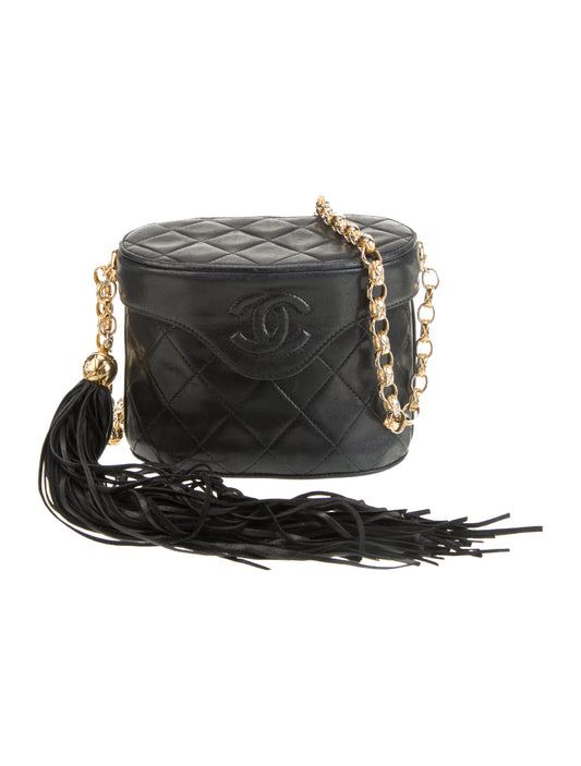 Sac seau matelassé à pampille