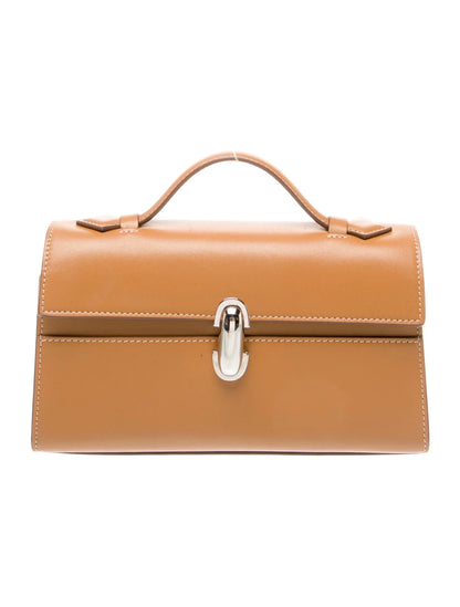 Pochette asimétrica de piel