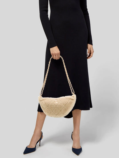 Sac hobo Coco Neige en peau lainée 2024