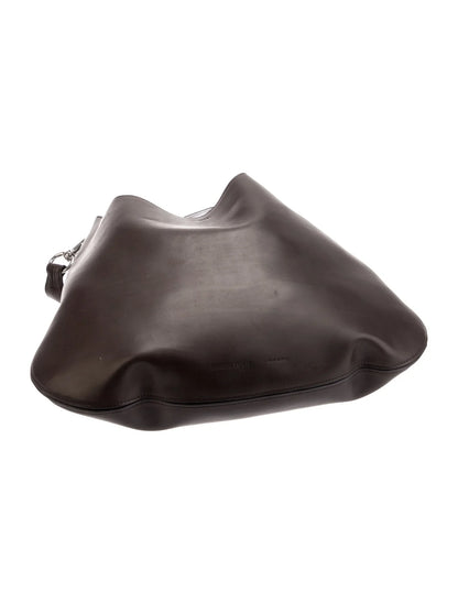 Puf pequeño de cuero