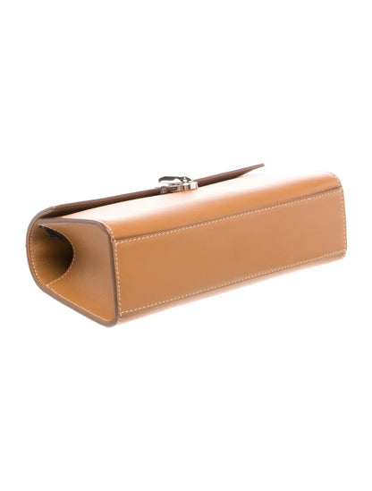 Pochette asimétrica de piel